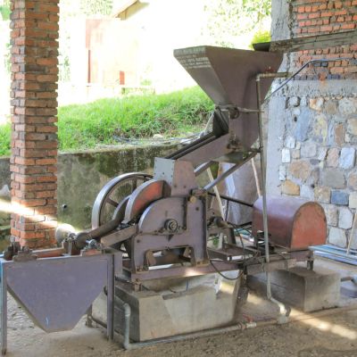 The single-disc depulper that is used to remove the outer cherry and much of the fruit from the green coffee seeds at the Ngororero coffee washing station ("CWS") in Ngororero, Rwanda.